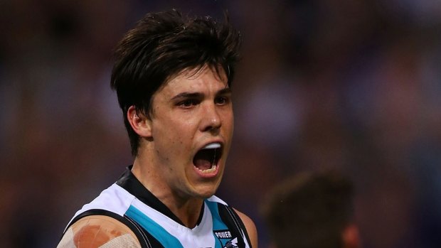 Sidelined: Angus Monfries of Port Adelaide.