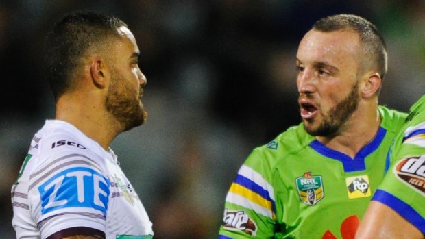 Chirpy: Dylan Walker and Canberra's Josh Hodgson go at it.