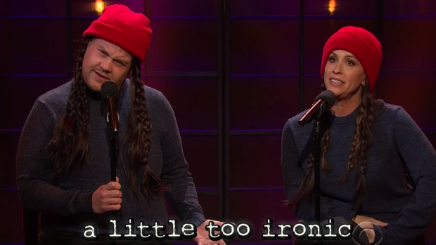 Alanis Morisette performs updated lyrics to 'Ironic' with James Corden in 2015.