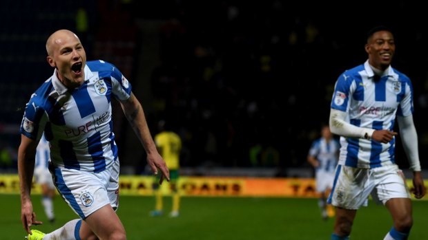 Aaron Mooy's Huddersfield will fight for a place in the Championship playoff.