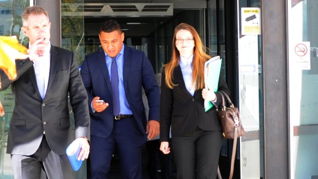 Axed: Canberra Raider Josh Papalii, centre, leaving the ACT Magistrates Court before his sacking from the Kangaroos.