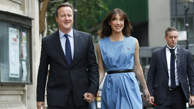 British Prime Minister David Cameron and his wife Samantha arrive to vote in the EU referendum.