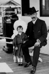 Man and child on a ship bound for Australia. (Circa 1900-1910)