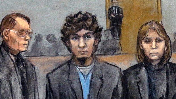 Dzhokhar Tsarnaev, centre, in a courtroom sketch with his lawyers upon his conviction on April 8.