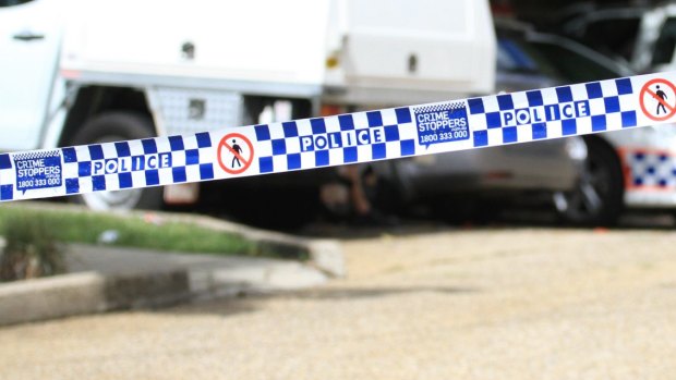 Police are investigating after a woman's body was found by concerned colleagues at her Cairns home.