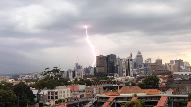 Lightning strikes Sydney during Friday afternoon's severe thunderstorms.