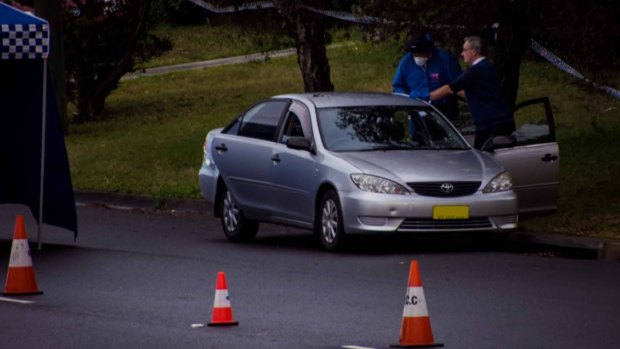 Police have closed two lanes of Griffiths Road in Lambton after finding a body in a car.