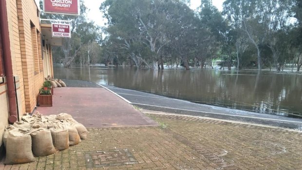 Floodwaters lapped at the heels of the Glenelg Inn on Sunday morning.