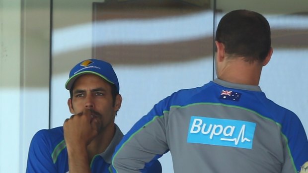 Bowing out: Mitchell Johnson looks on during the last day of the second Test.