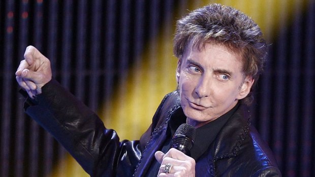 Barry Manilow, on stage in 2012, has reportedly married his long-term boyfriend Garry Kief.