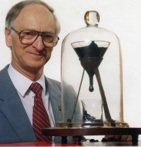 The late John Mainstone with the pitch drop experiment. Photo: Facebook
