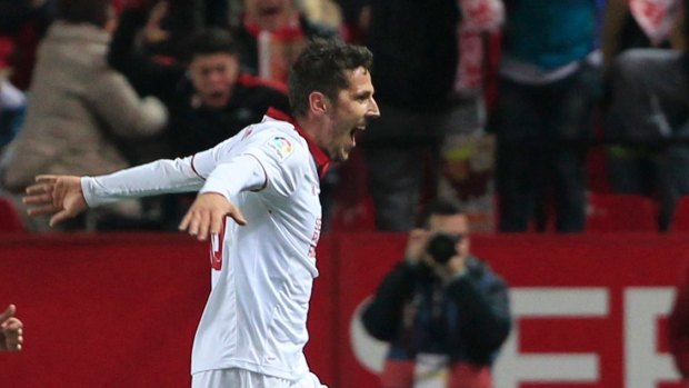 Sevilla's Stevan Jovetic, right, celebrates after scoring the winner against Real Madrid.