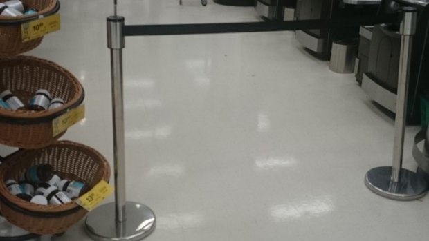 The barrier put up at manned checkouts late at night at my local Woolies.