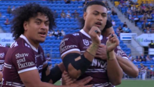 Haumole Olakau’atu’s try celebration in support of Manase fainu.