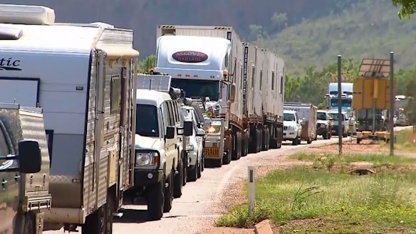 Hundreds of cars line up at the WA-NT border. 