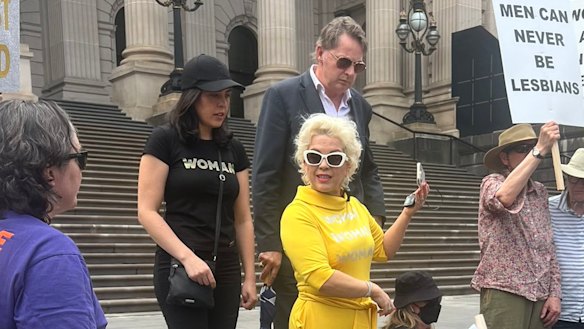 Kellie-Jay Keen-Minshull, who also goes by the name Posie Parker, with Liberal MP Moira Deeming (in black) on Saturday.