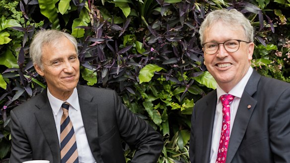 Ramsay Centre chief executive Professor Simon Haines with University of Wollongong vice-chancellor Professor Paul Wellings after signing the deal. 