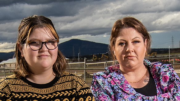 “We’re stuck paying rent and the progress repayments, and we’re still on hold,” said Kate Saha, seen here with her daughter, Armahni.