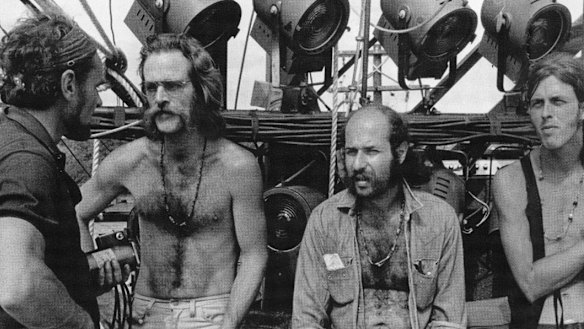 Lighting director and MC of Woodstock Chip Monck, second from the left, during the construction of the stage. 