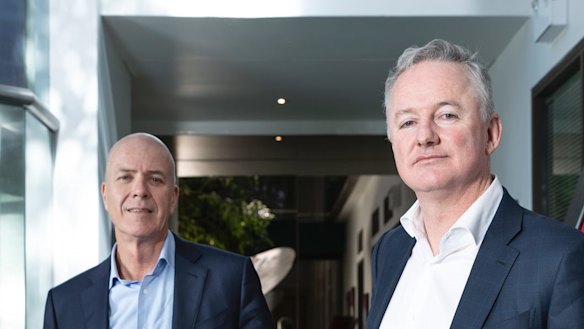 The court has approved the merger of Nine and Fairfax Media. Fairfax CEO Greg Hywood, left, and Nine boss Hugh Marks.