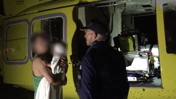 A toddler has been flown to hospital after he was dragged from a caravan by a dingo on Fraser Island. 