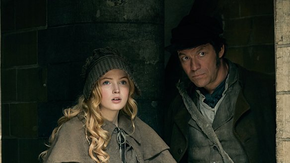Ellie Bamber as Cosette and Dominic West as Jean Valjean.