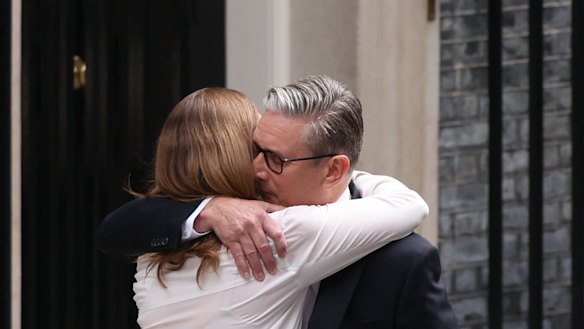 British Prime Minister Keir Starmer hugs his wife, Victoria Starmer, after announcing his resignation.