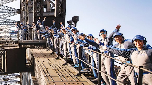 Tourists on the Harbour Bridge climb in Sydney.