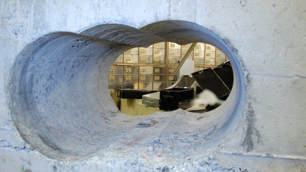 Run the jewels: The thieves used a heavy duty drill to bore holes into the vault wall. 