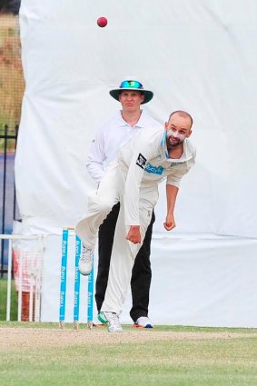 Lyon's share: Blues spinner Nathan Lyon in action.