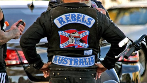 A Rebels Outlaw member will face court on charges of family violence.