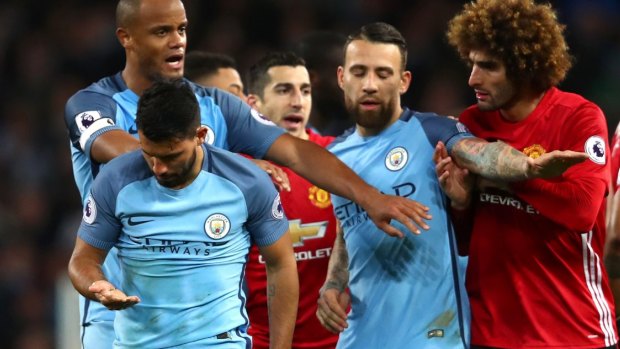 Flashpoint: Sergio Aguero of Manchester City walks away following an incident with Marouane Fellaini of Manchester United.
