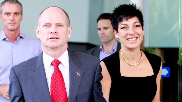 Premier Campbell Newman with his wife Lisa leaving their hotel for the funeral in Cairns.