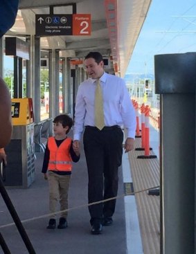 Murrumba MP Chris Whiting and young son, Guy, at the new Kippa Ring train station