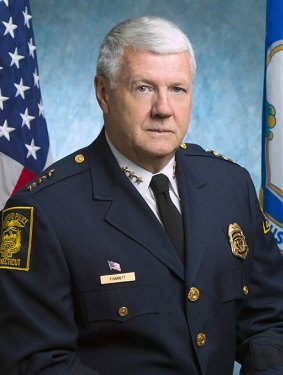Former New York police chief Patrick Harnett is indirectly responsible for solving thousands of crimes in Victoria, even though he has never worked here. 