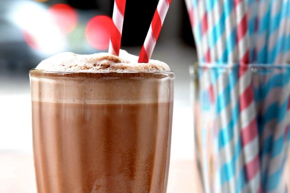 A double chocolate and peanut butter shake made from white milk