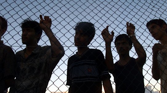 Asylum seekers on their first day in the detention centre on Nauru.