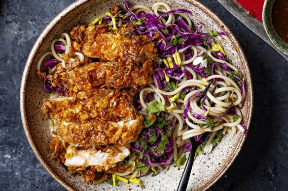 Cornflake-crumbed chicken with honey miso chilli dressing and messy noodles.