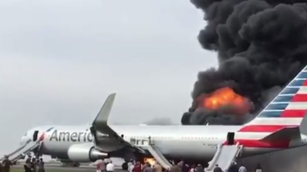 The plane burst into flames on the runway.