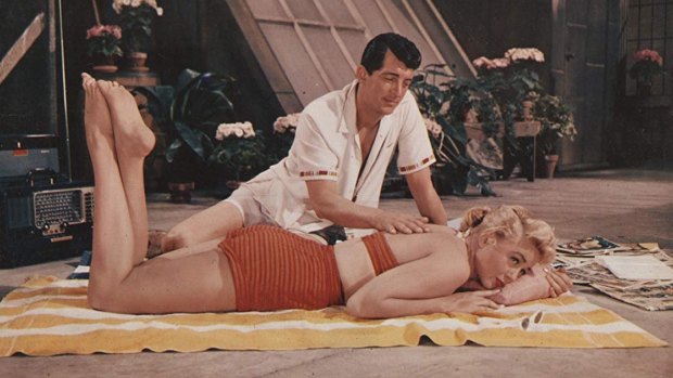 Dean Martin and Dorothy Malone in Artists and Models.