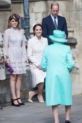 Catherine, Duchess of Cambridge, curtsies to the Queen. 