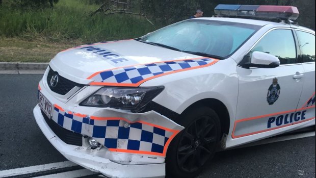 Two people have been arrested following a police car crash at Goodna.