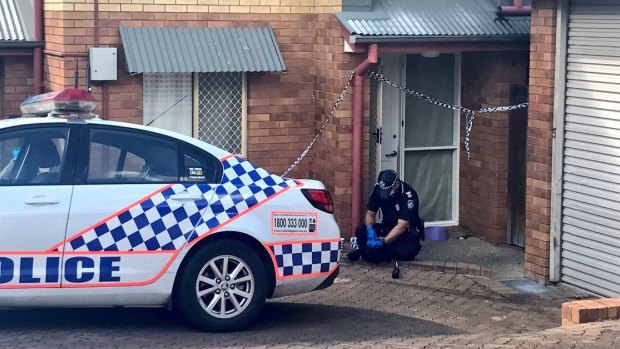 Police at the Northgate townhouse last month, where paramedics found Maddilyn-Rose Stokes unconscious and not breathing.