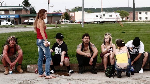 Selling magazine subscriptions door to door ... McCaul Lombardi, Riley Keough, Verronikah Ezell, Shia LaBeouf, Crystal B. Ice, Shawna Rae Moseley and Kenneth Kory Tucker in <i>American Honey</i>.