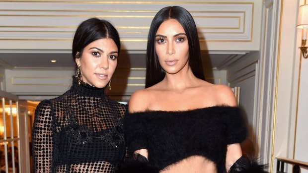 Kim Kardashian West, right, with her sister Kourtney.