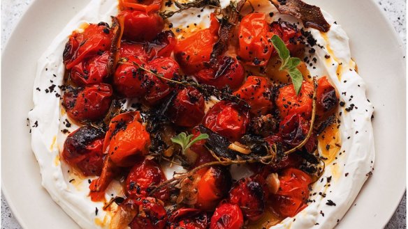 Hot charred cherry tomatoes with cold yoghurt from Yotam Ottolenghi's latest cookbook, Simple.