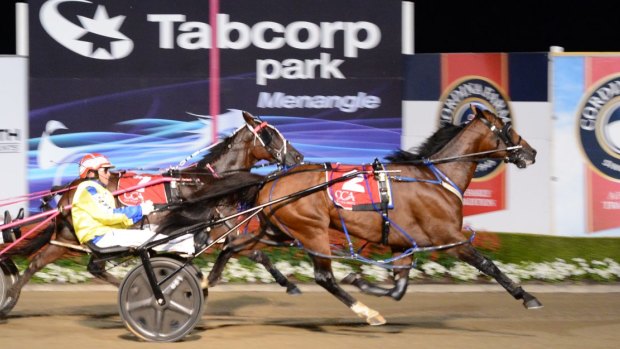 Legend: Chris Alford steers Lennytheshark to victory in this year's Miracle Mile.