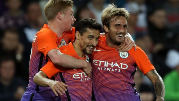 Manchester City's Aleix Garcia (right) celebrates scoring his side's second goal.