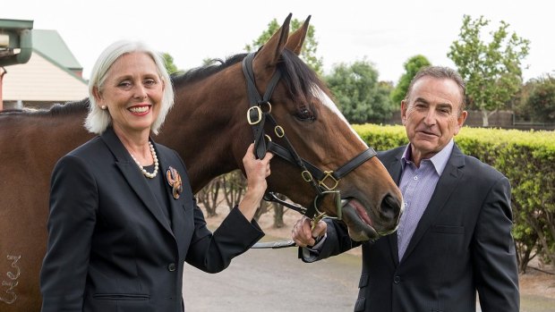 Tabcorp chair Paula Dwyer and Tatts Group chair Harry Boon will be side by side on Tabcorp's board should the $11.3 billion merger be successful. 