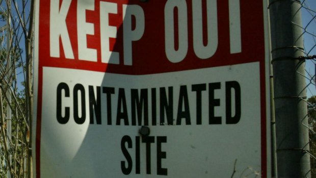 A generic 'Keep Out - contaminated site' sign.